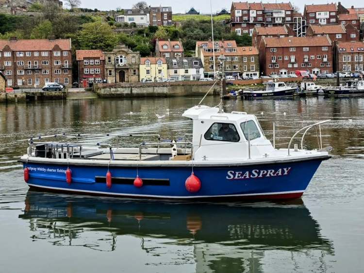 The SeaSpray boat in the harbour at Whitby